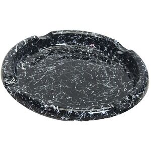 vintage mid-century glass ashtray featuring a white spaghetti splatter design